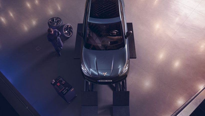 Top view of a CUPRA Tavascan getting serviced
