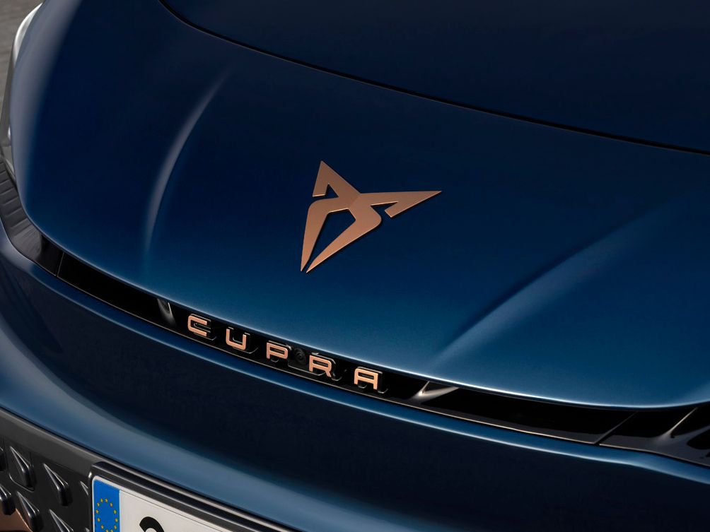 Close up of the CUPRA Born logo on it's bonnet
