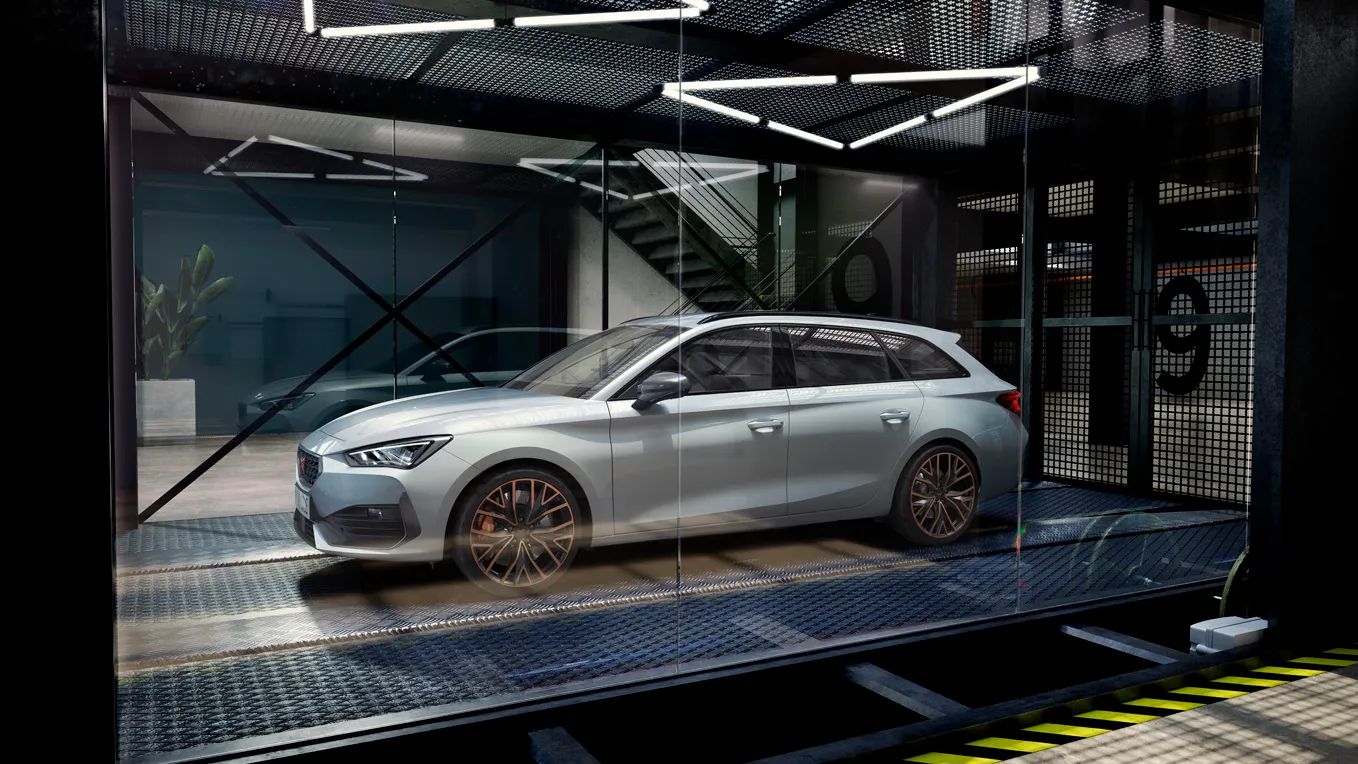 A CUPRA Leon parked in a glass garage