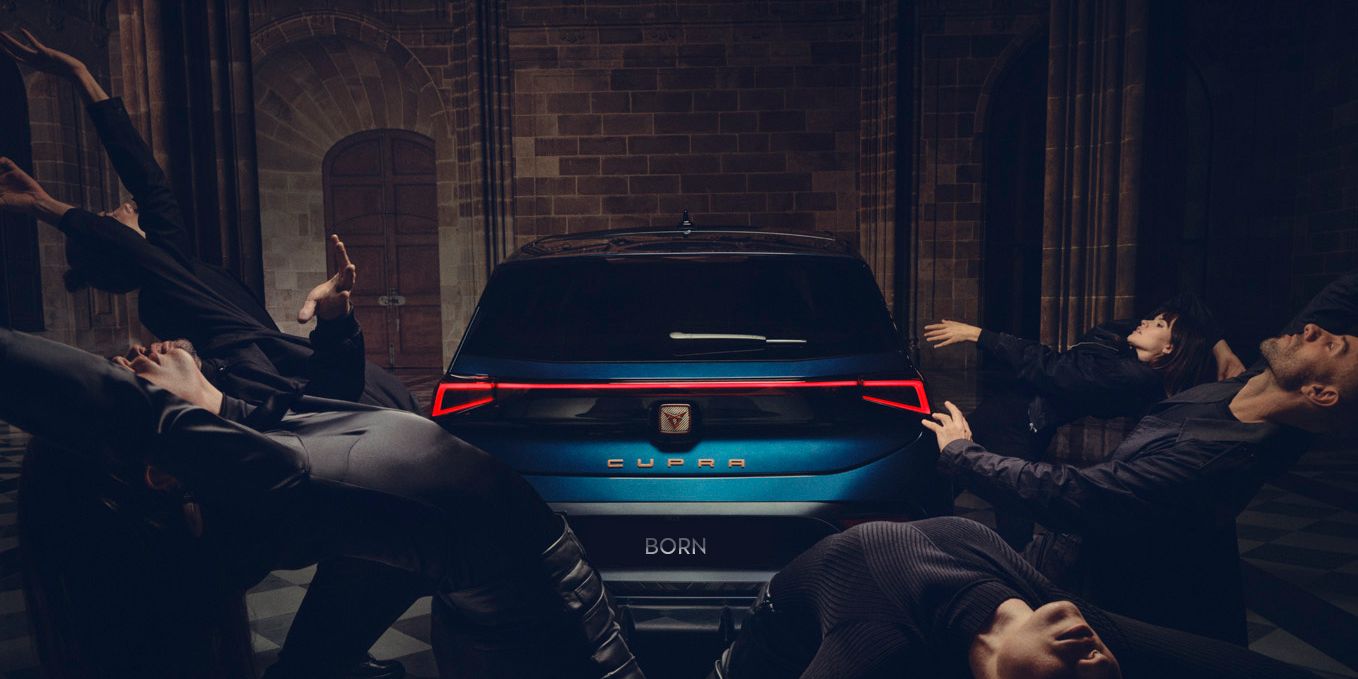 Rear view of CUPRA Born with dancers around the car