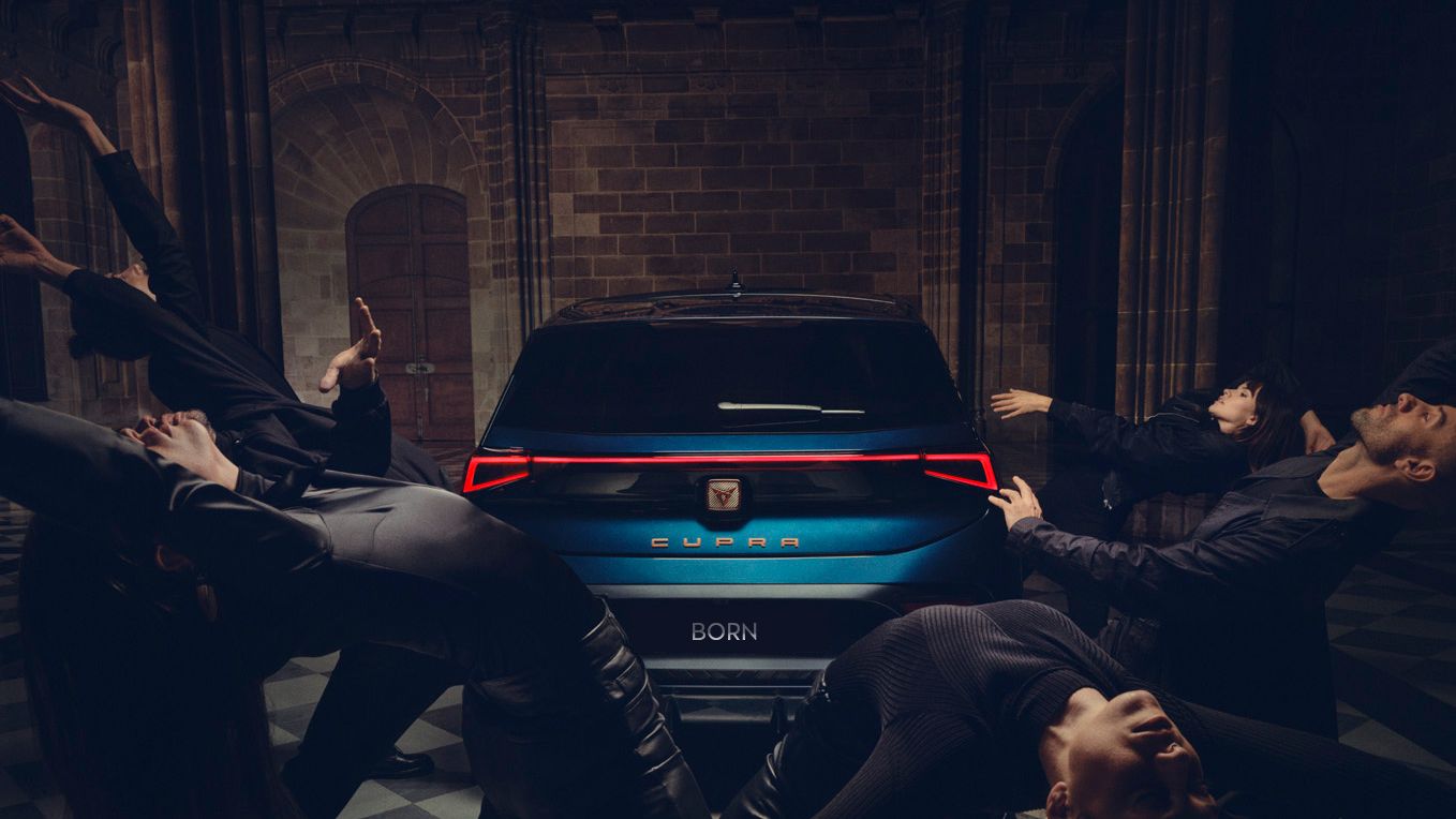 Rear view of CUPRA Born with dancers around the car