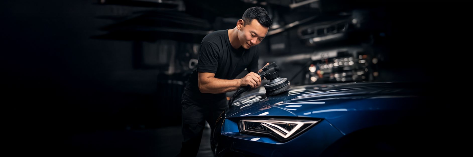 A CUPRA servicing crew polishing a blue CUPRA 