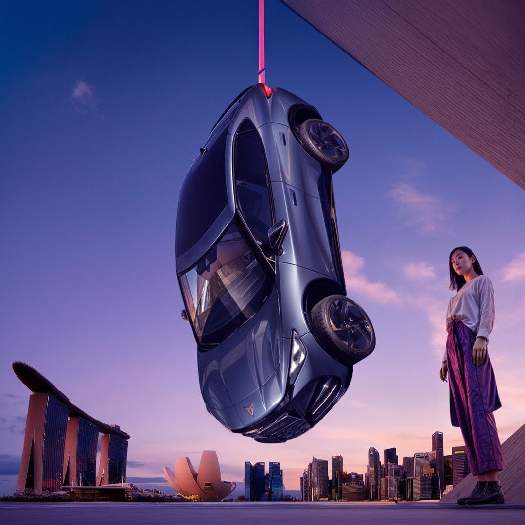 CUPRA Tavascan hanging by the Singapore CIty view with a Singaporean lady standing beside
