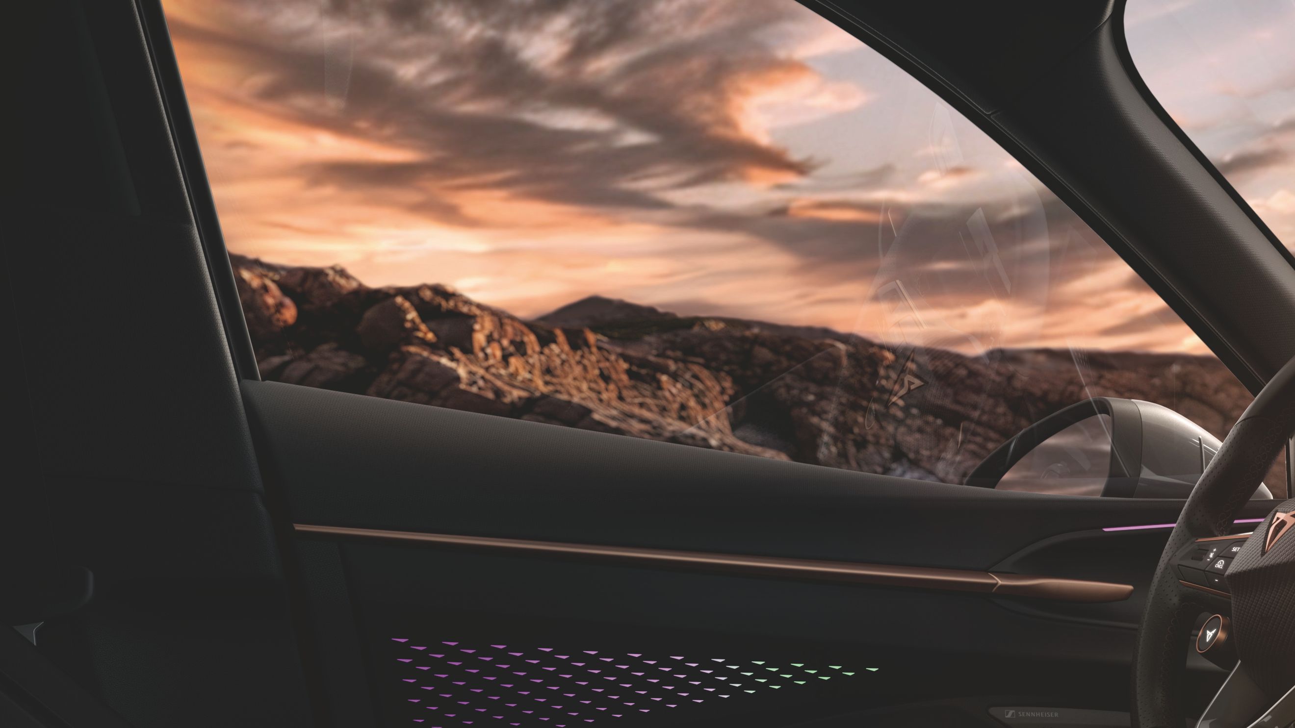 CUPRA Terramar interior close up shot of the side door illumination light, steering wheel and infotainment screen 