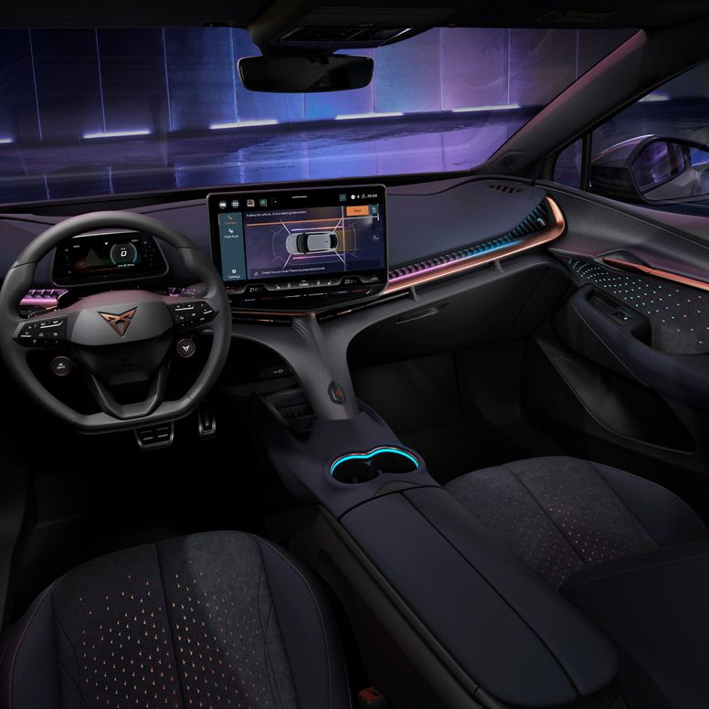 CUPRA Tavascan interior, infotainment system showing park distance control for front and rear