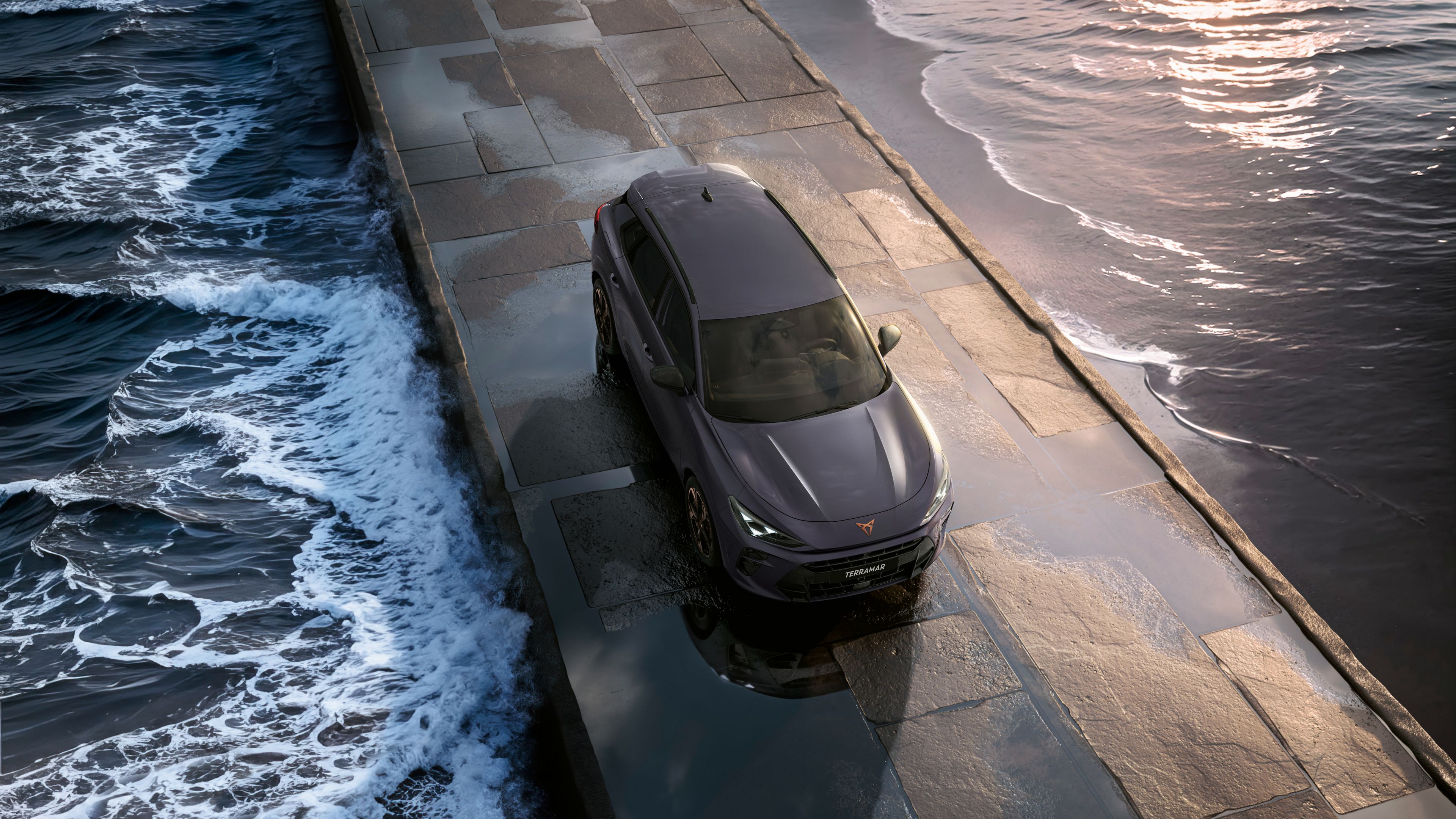 CUPRA Terramar driving across the ocean on a paved bridge