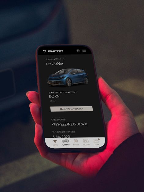 A mobile showing CUPRA SG App with a CUPRA Born in the background