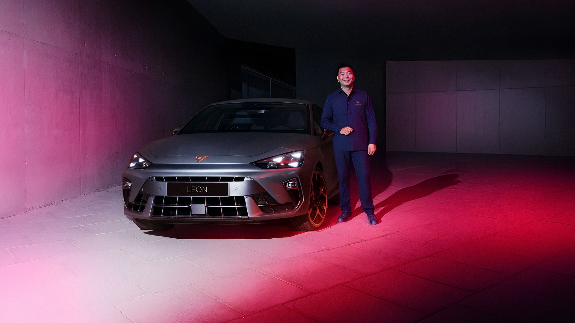 CUPRA Master standing beside CUPRA Leon