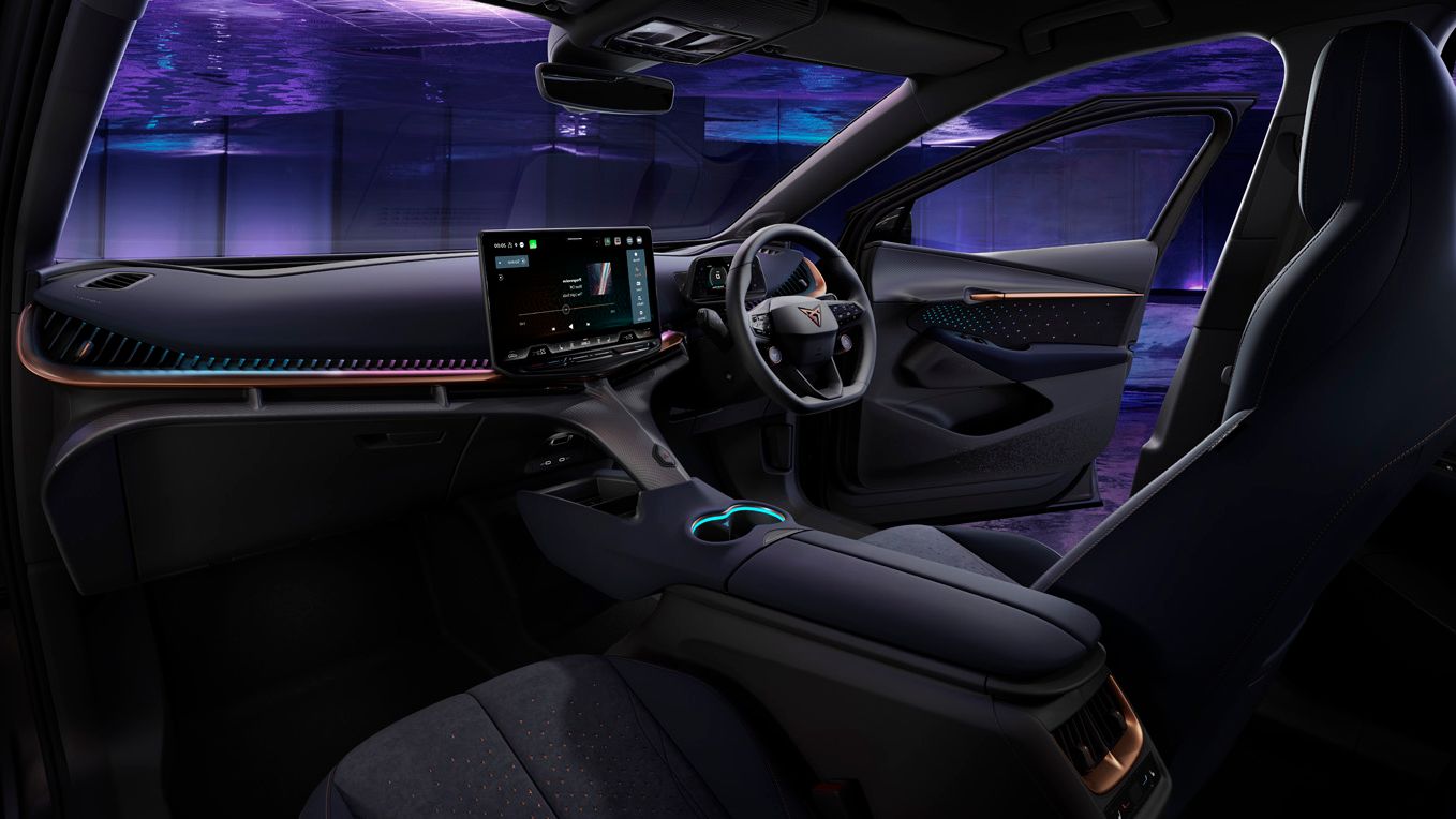 Interior of CUPRA Tavascan, ambient lighting, the outside view is dark purple and blue