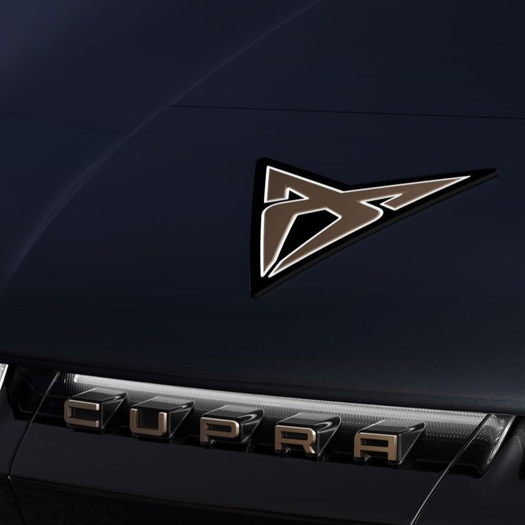 Close up shots of CUPRA Tavascan illuminated logo