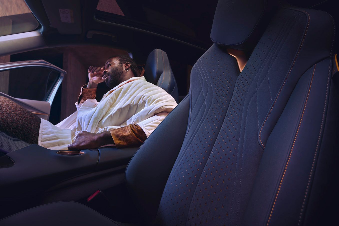 A guy sitting inside CUPRA Tavascan 