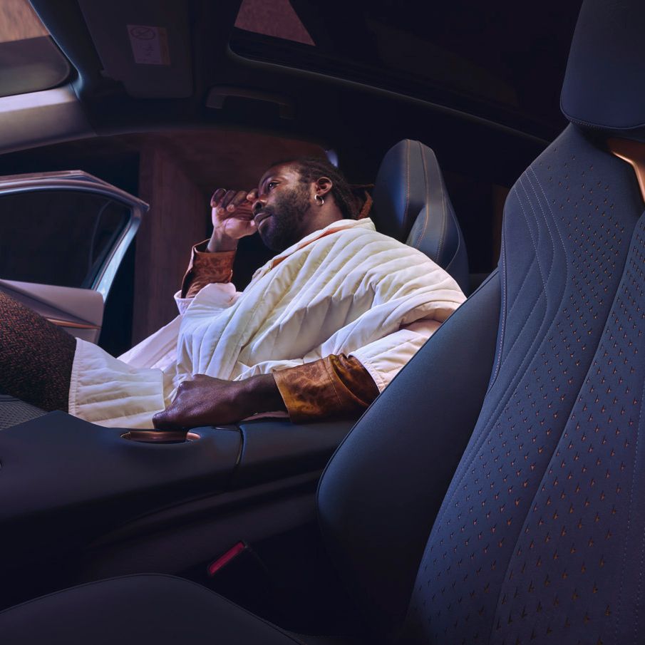 A guy sitting inside CUPRA Tavascan 