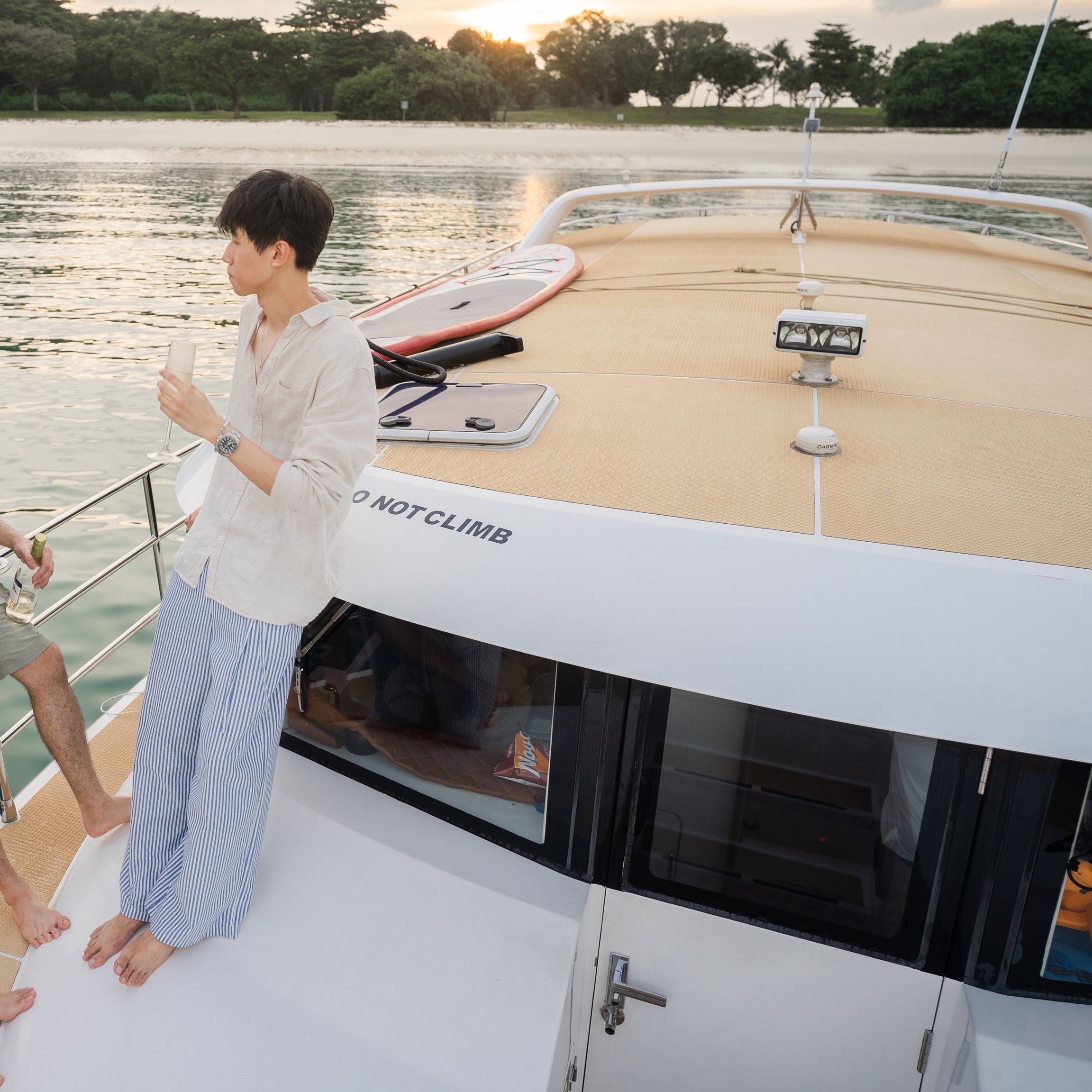 a background of people enjoying their time on a yatch
