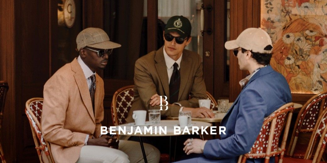 three men in casual suits from Benjamin barker brand by a cafe