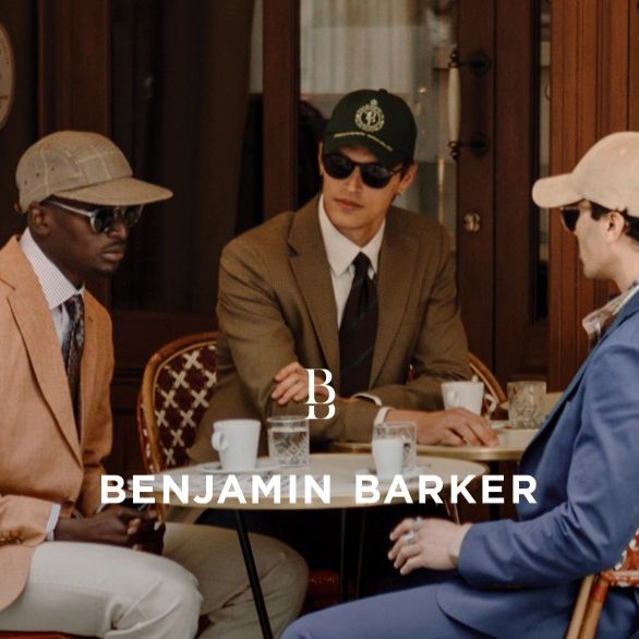 three men in casual suits from Benjamin barker brand by a cafe