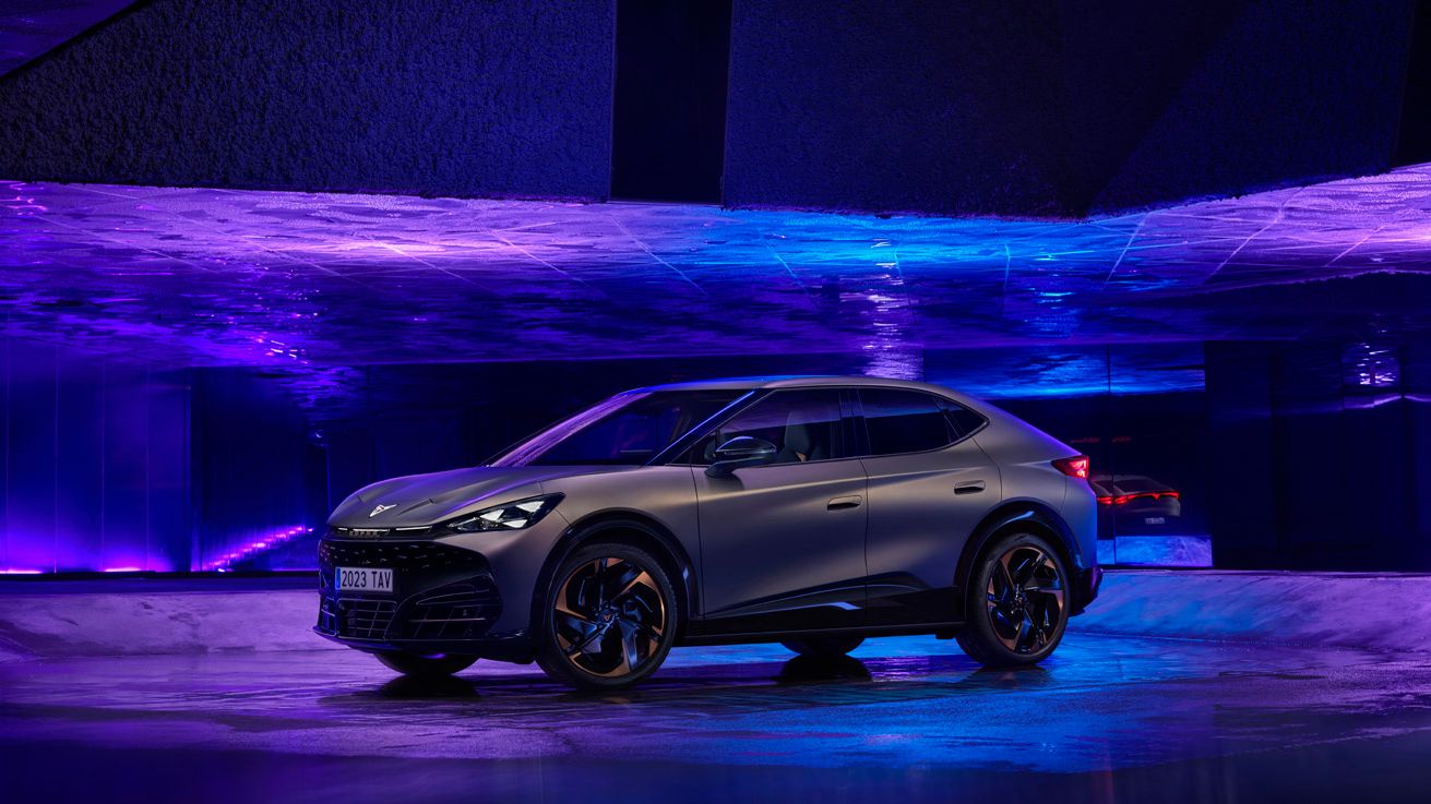 CUPRA Tavascan in studio with dark blue and purple background