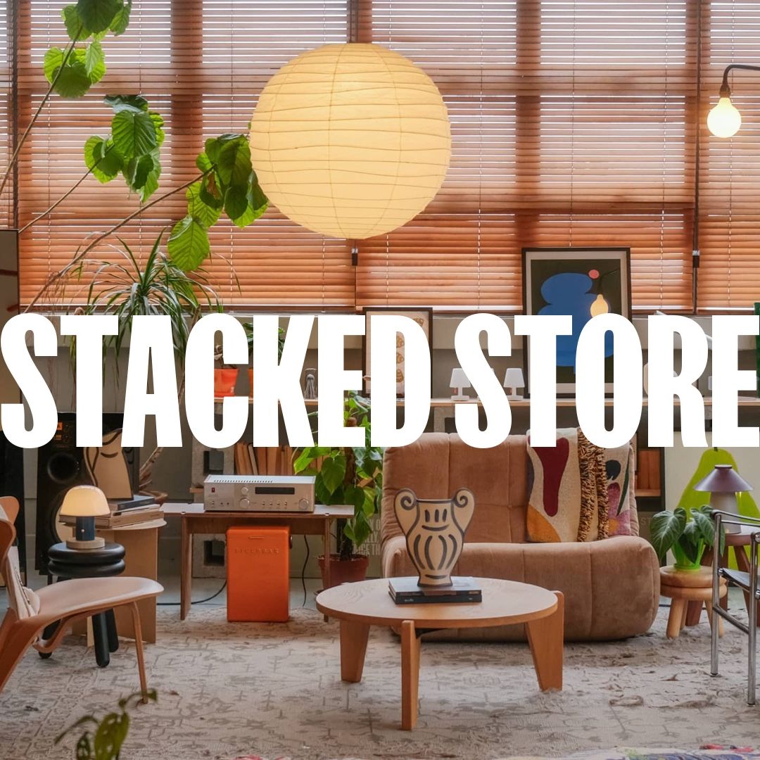 stacked store logo with a background of neatly place furnitures