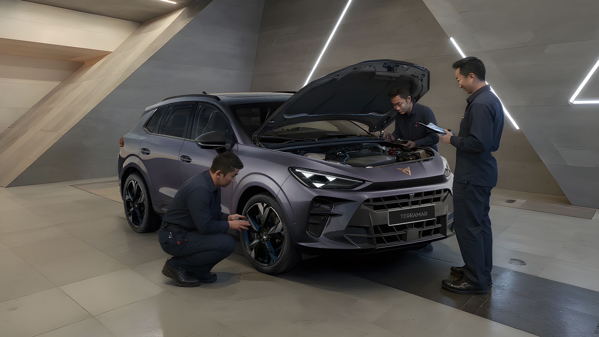 Mechanic engineer inspecting on CUPRA Terramar front engine and tyre 