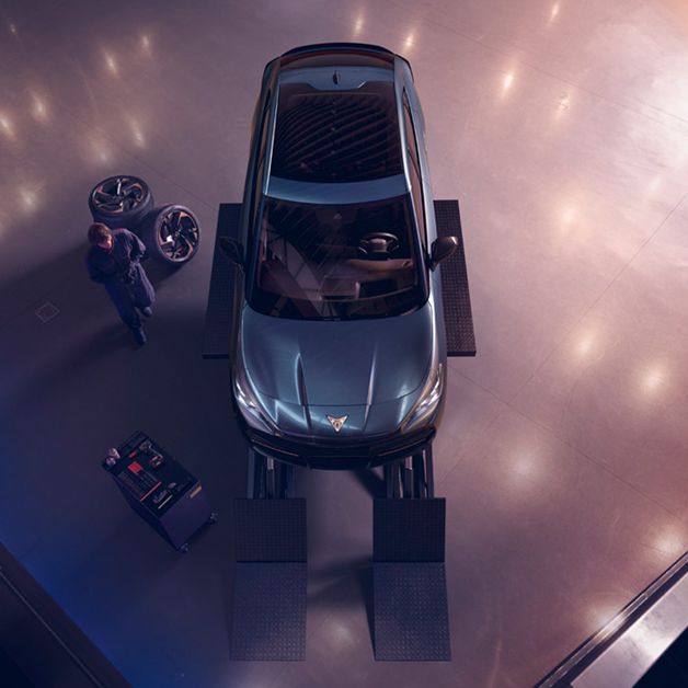 Top view of the CUPRA Tavascan getting serviced