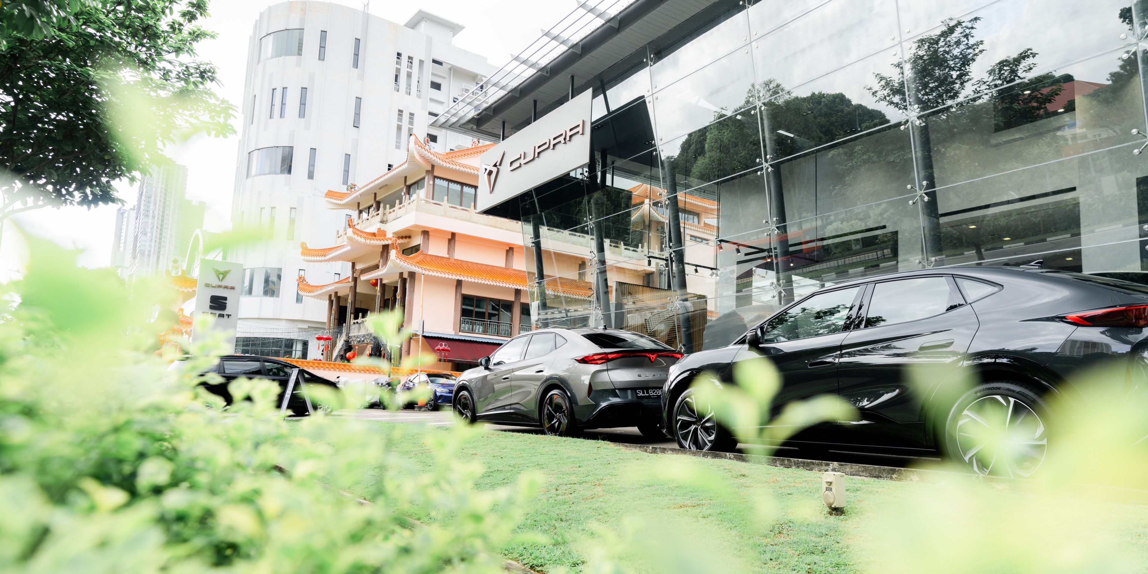 CUPRA Showroom featuring CUPRA Tavascan at the side