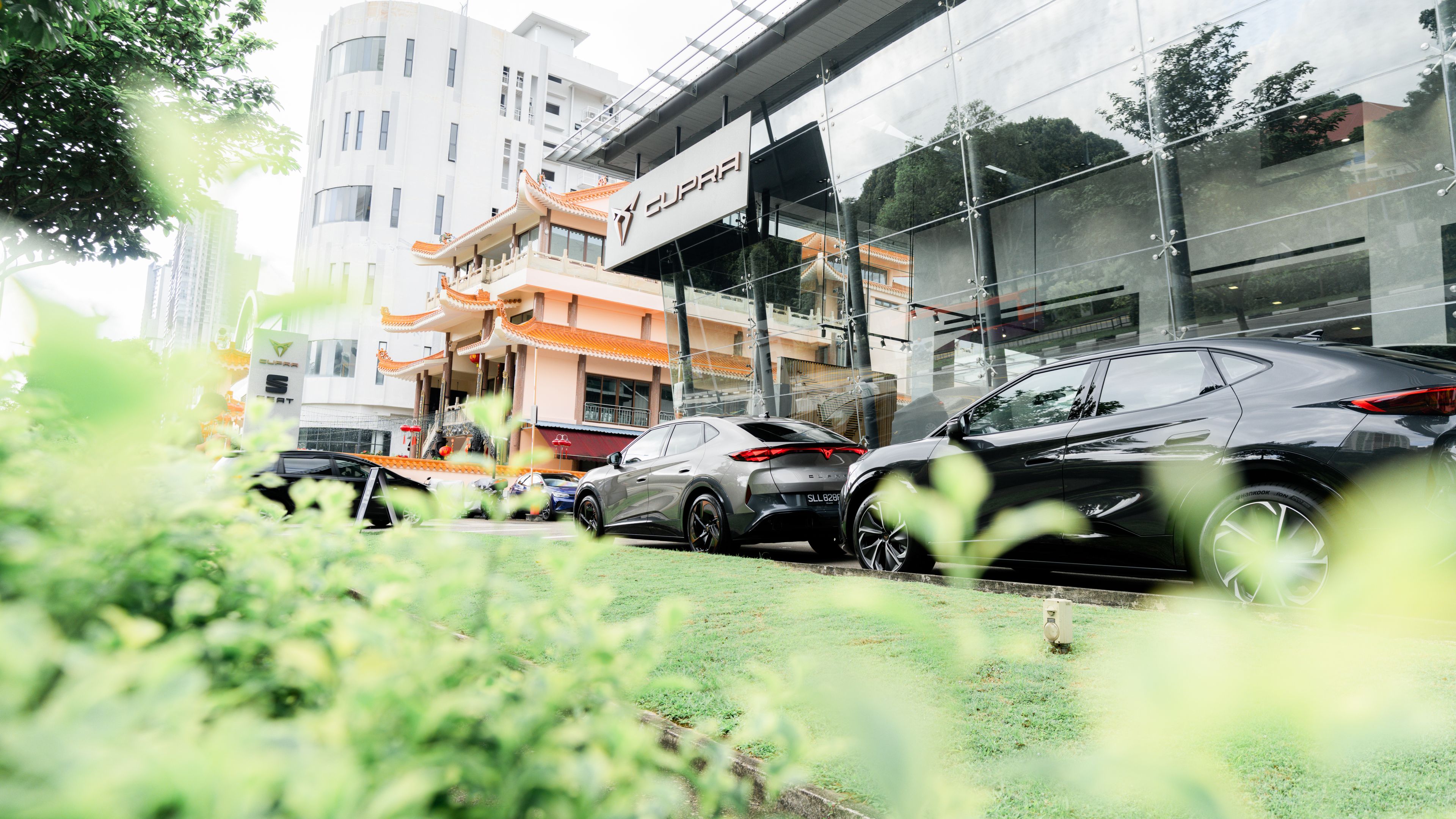 CUPRA Showroom featuring CUPRA Tavascan at the side