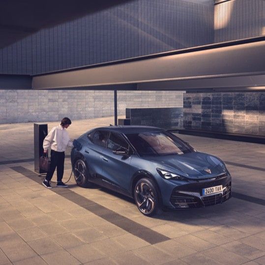 CUPRA Tavascan being charged by Moon charger