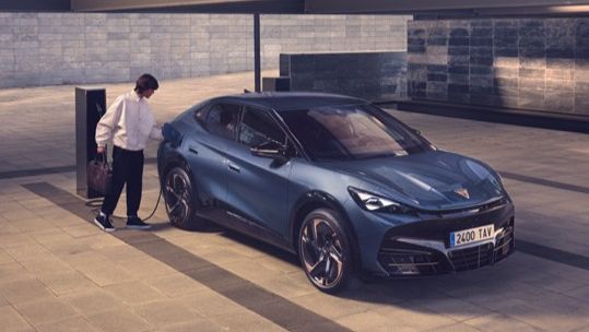 CUPRA Tavascan being charged by Moon charger