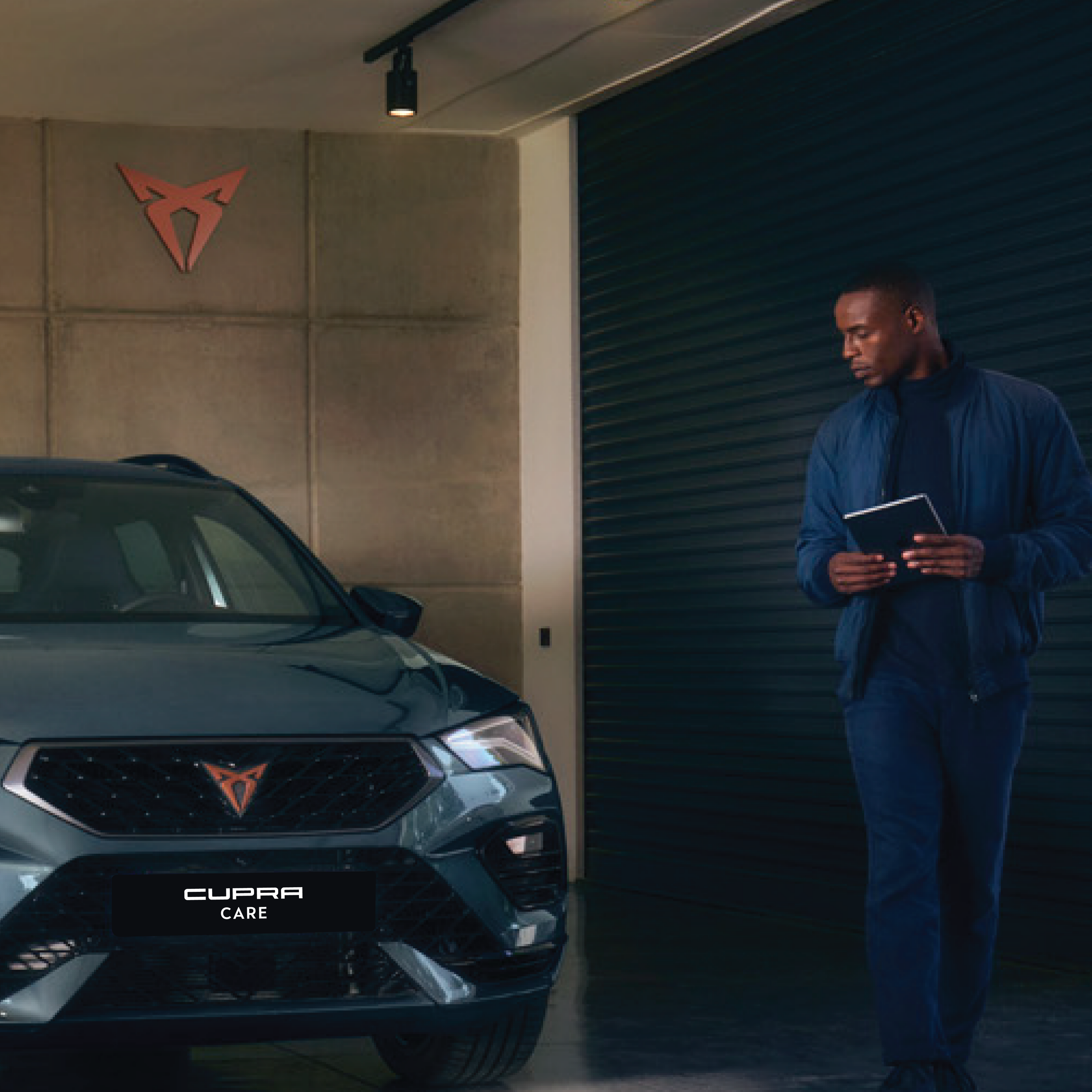 A guy looking at the CUPRA Formentor