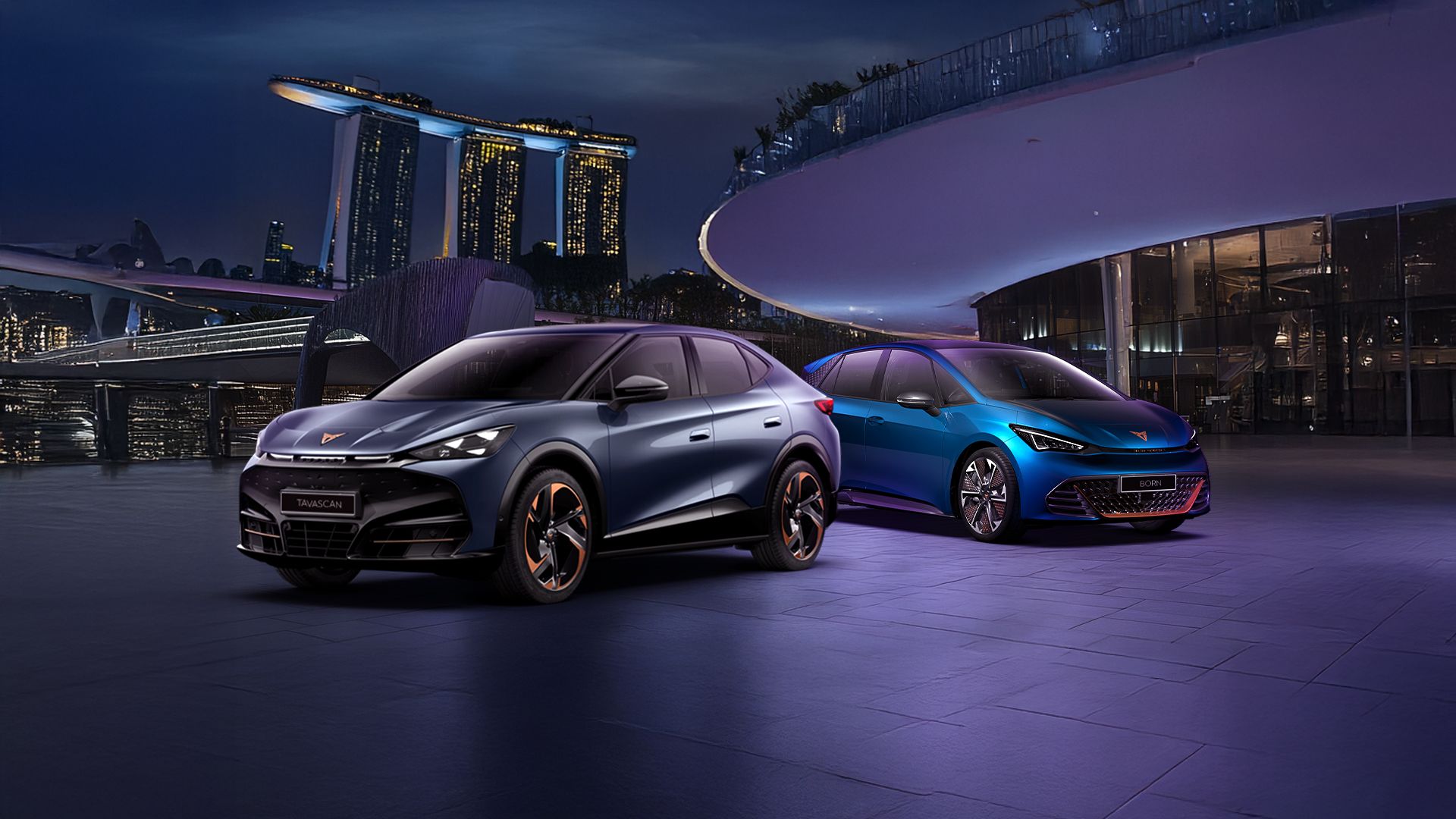 CUPRA Tavascan and Born parking side by side with marina bay at the background